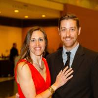 Couple posing outside the Enrichment Dinner
